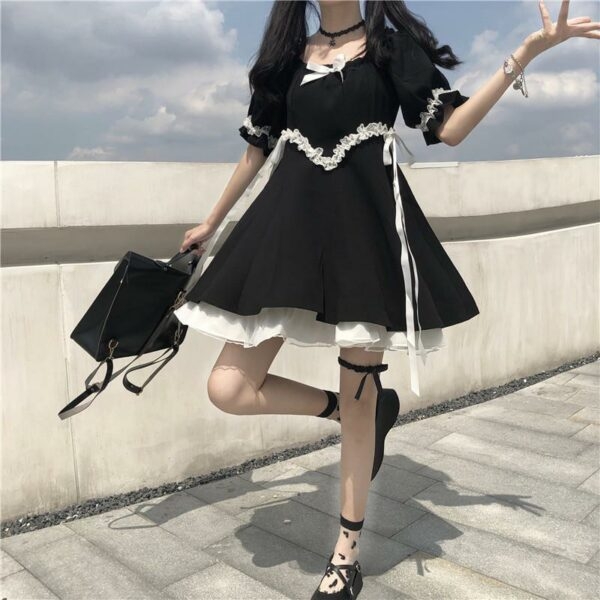 Schwarzes Mädchen-Lolita-Kleid Mädchenpuppen kawaii
