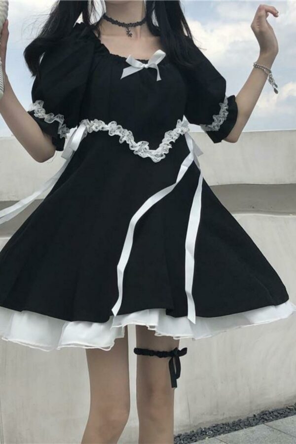 Schwarzes Mädchen-Lolita-Kleid Mädchenpuppen kawaii