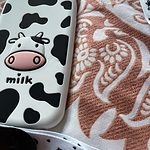 Custodia per iPhone con simpatica mucca da latte