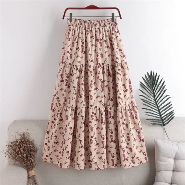 Blommig plisserad kjol med hög midja