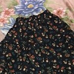Falda plisada floral de cintura alta