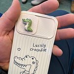 Custodia per iPhone con protezione per fotocamera a scorrimento con dinosauro carino