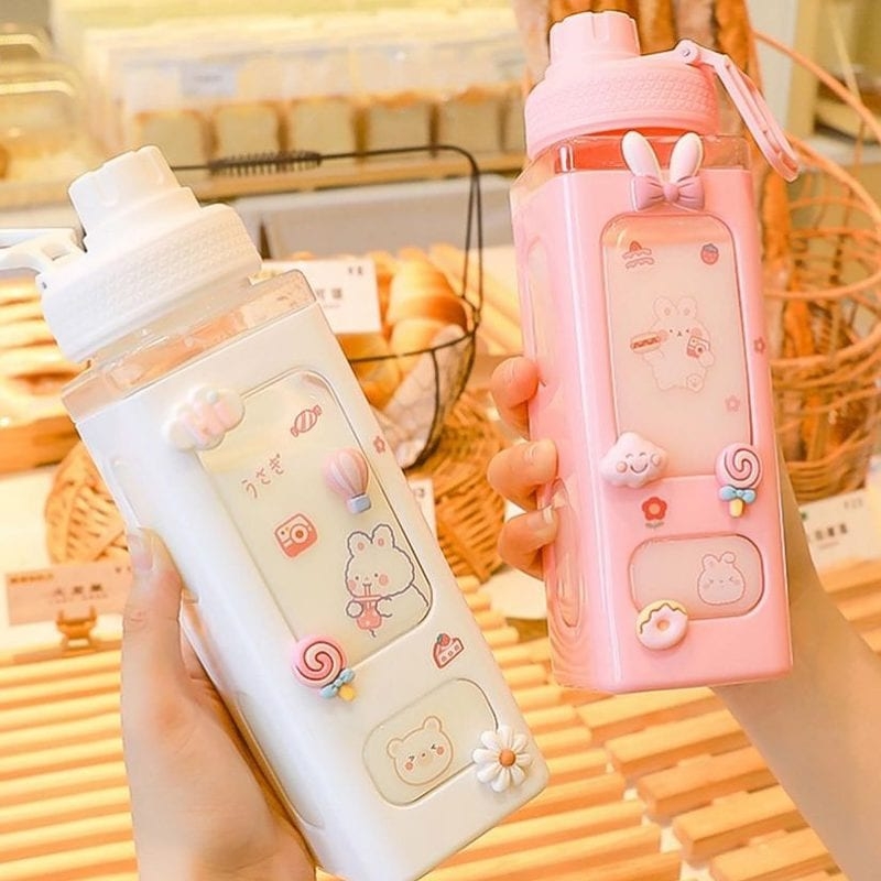 https://cdn.kawaiifashionshop.com/wp-content/uploads/2022/03/Kawaii-Bear-Pastel-Water-Bottle-With-3D-Sticker-700ml-900ml-Plastic-Travel-Tea-Juice-Milk-Portable-2.jpg