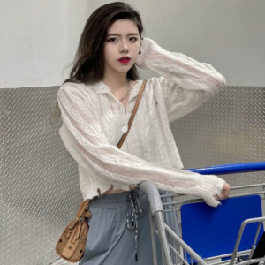 Top de punto de manga larga trenzado transparente de moda coreana