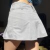 Mini-jupe vintage à poche tissée taille basse