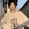 Kawaii Stereo lockeres T-Shirt mit Blumenmuster