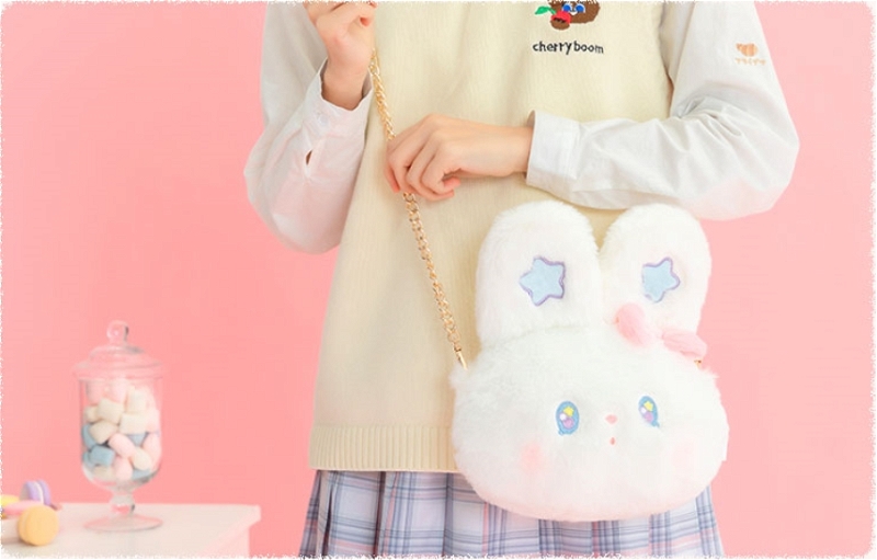 Looking for a cute and stylish bag to express your unique personality? The Kawaii White Plush Rabbit Messenger Bag is the perfect choice! With its super soft short plush, curly plush, and cotton fabric construction, it offers luxurious comfort and outstanding durability. This beautiful bag features an adorable white rabbit adorning a star pattern across the front. Its 21cm x 27cm size adds just enough storage room for all of your everyday needs without feeling bulky on your shoulder. Specifications: Name: Dot Star Rabbit Messenger Bag Material: super soft short plush + curly plush + cotton Bag size: 21*27cm; bag chain length 115cm Package Includes: 1 * Kawaii White Plush Rabbit Messenger Bag