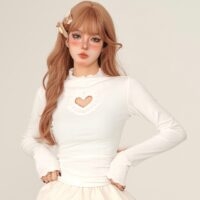 Top a maniche lunghe in pizzo a cuore cavo in stile dolce autunno kawaii