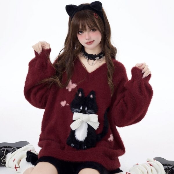 Słodki, dziewczęcy sweterek z haftowanym leniwym kotkiem jesienne kawaii